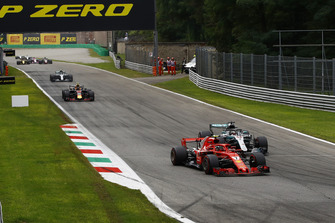 Kimi Raikkonen, Ferrari SF71H and Lewis Hamilton, Mercedes AMG F1 W09 battle