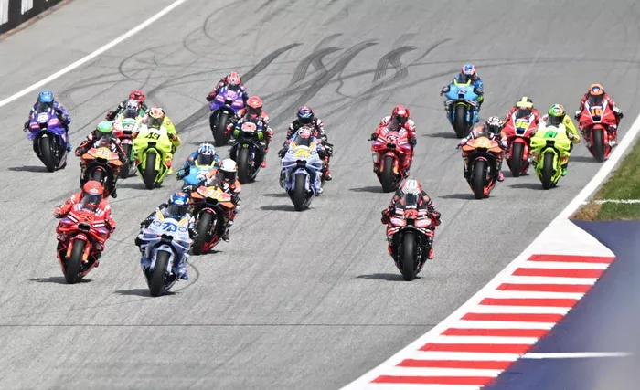 Riders take the start of the sprint race