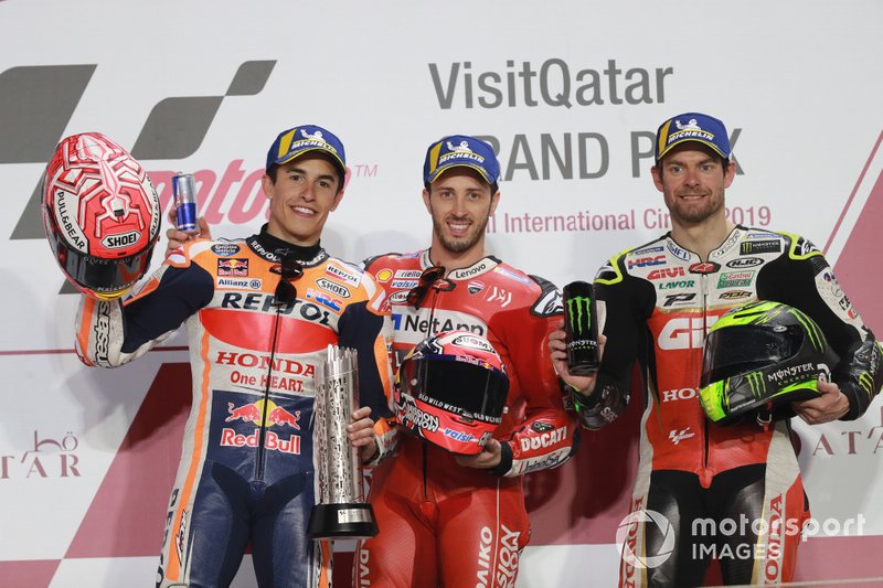 Подіум: друге місце Марк Маркес, Repsol Honda Team, переможець гонки Андреа Довіціозо, Ducati Team, третє місце Кел Кратчлоу, Team LCR Honda