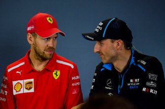 Sebastian Vettel, Ferrari and Robert Kubica, Williams Racing in Press Conference