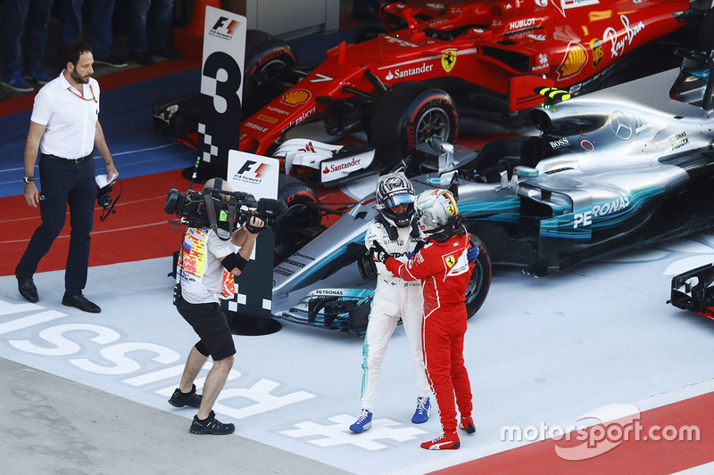 Race winner Valtteri Bottas, Mercedes AMG F1, Sebastian Vettel, Ferrari SF70H