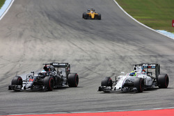 Fernando Alonso, McLaren MP4-31; Felipe Massa, Williams FW38