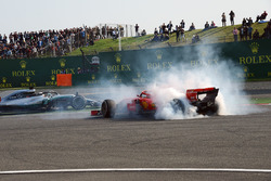 Sebastian Vettel, Ferrari SF71H spins after clashing with Max Verstappen, Red Bull Racing RB14 as Lewis Hamilton, Mercedes-AMG F1 W09 EQ Power+ passes