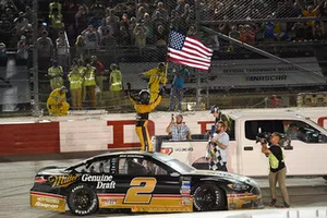 Brad Keselowski, Team Penske, Ford Fusion Miller Genuine Draft celebrates his win