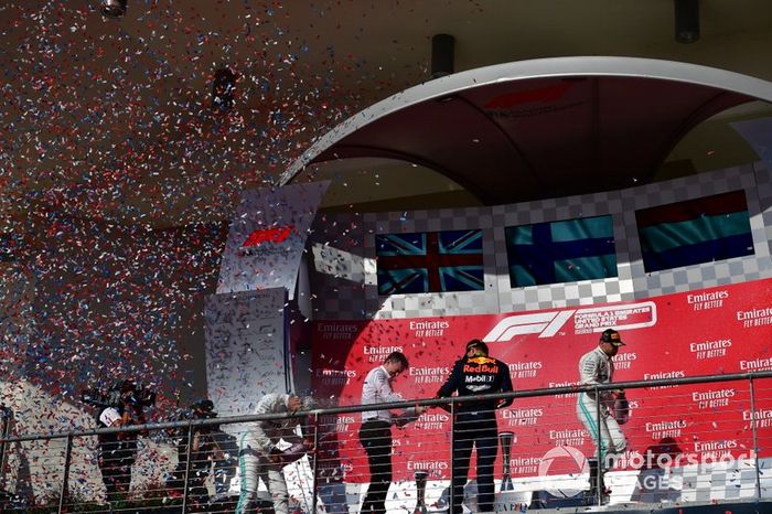 Lewis Hamilton, Mercedes AMG F1, 2nd position, James Allison, Technical Director, Mercedes AMG, Max Verstappen, Red Bull Racing, 3rd position, and Valtteri Bottas, Mercedes AMG F1, 1st position, celebrate on the podium