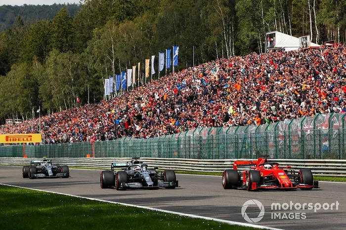 Sebastian Vettel, Ferrari SF90, leads Lewis Hamilton, Mercedes AMG F1 W10 and Valtteri Bottas, Mercedes AMG W10