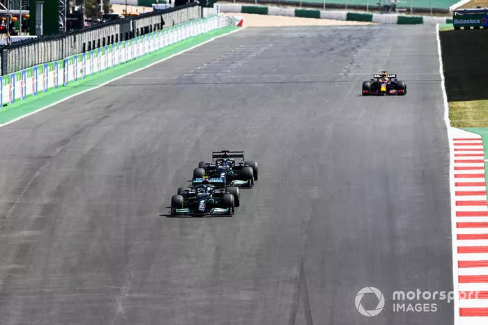 Lewis Hamilton, Mercedes W12, battles with Valtteri Bottas, Mercedes W12