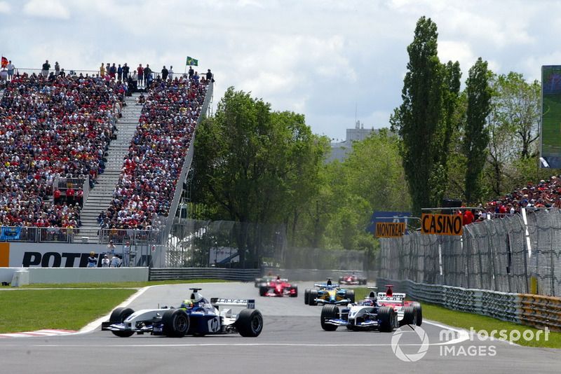 Ralf Schumacher, Williams BMW FW25 delante de Juan Pablo Montoya, Williams BMW FW25 y Michael Schumacher, Ferrari F2003-GA