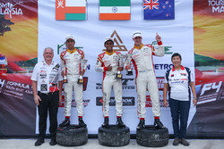 Podium: race winner Akash Gowda, second place Faine Kahia, third place Khalid Al Wahaibi