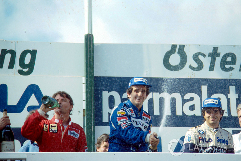 Podium : le vainqueur Alain Prost, le deuxième René Arnoux, le troisième Nelson Piquet