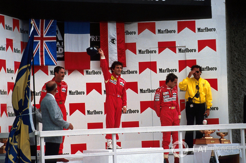 Podium: race winner Alain Prost, second place Nigel Mansell, third place Gerhard Berger