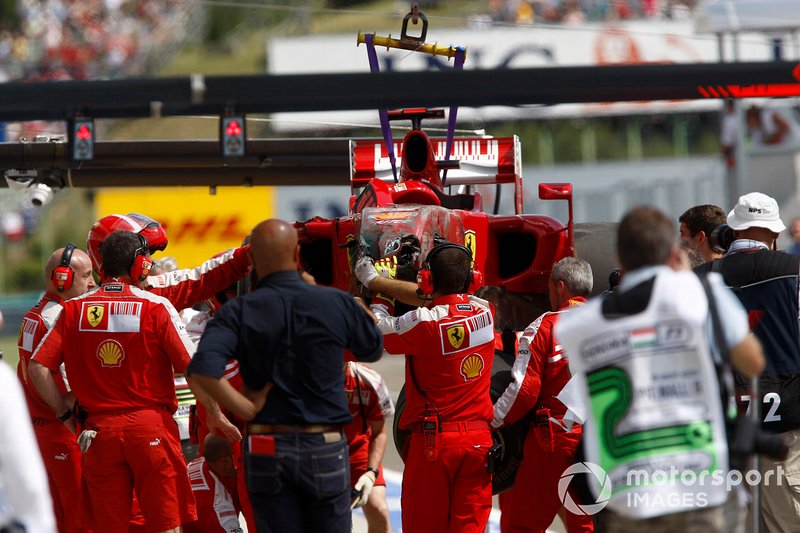 The Ferrari F60 of Felipe Massa is returned to the pits
