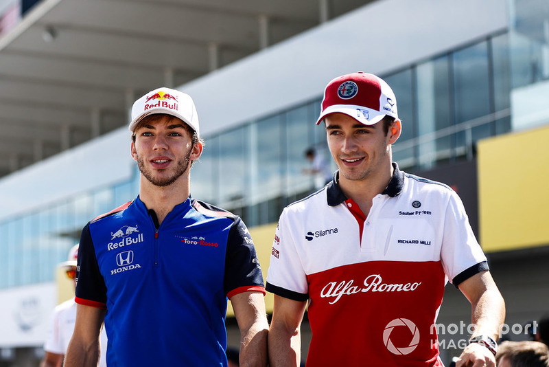 Pierre Gasly, Scuderia Toro Rosso, with Charles Leclerc, Sauber