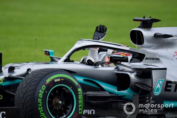 Lewis Hamilton, Mercedes AMG F1 W10, waves to fans from the cockpit