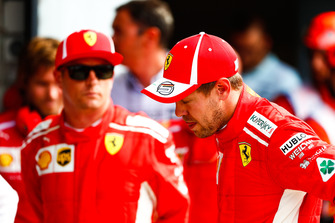Front row starters, pole man Kimi Raikkonen, Ferrari, and Sebastian Vettel, Ferrari