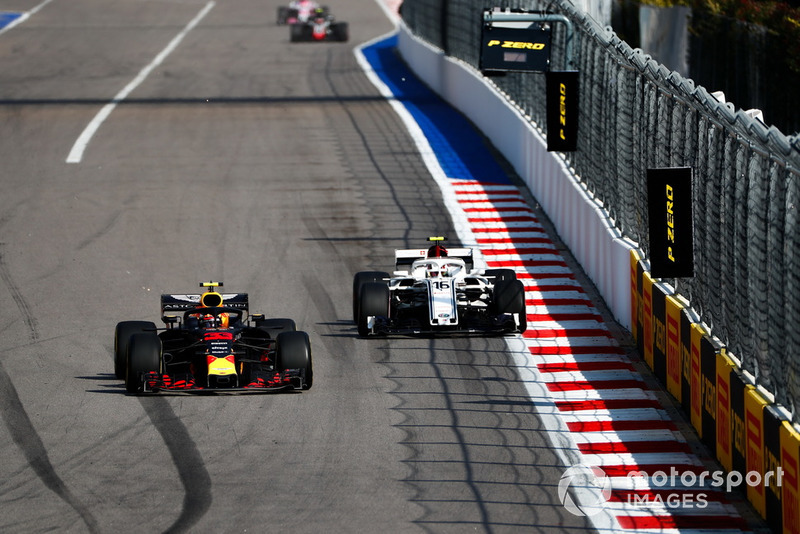 Max Verstappen, Red Bull Racing RB14, leads Charles Leclerc, Sauber C37
