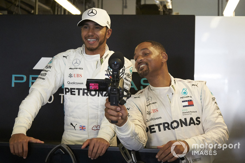 Lewis Hamilton, Mercedes AMG F1 and Will Smith in the garage