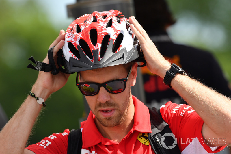 Sebastian Vettel, Ferrari and cycle helmet 