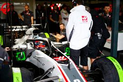 Romain Grosjean, Haas F1 Team VF-18 Ferrari, in the garage