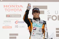 Podium: second place Yuji Kunimoto, Cerumo Inging