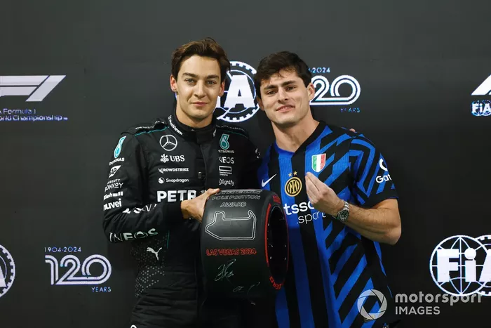 Pole man George Russell, Mercedes-AMG F1 Team, receives his Pirelli Pole Position Award from Gianluca QCP Conte, Food content creator