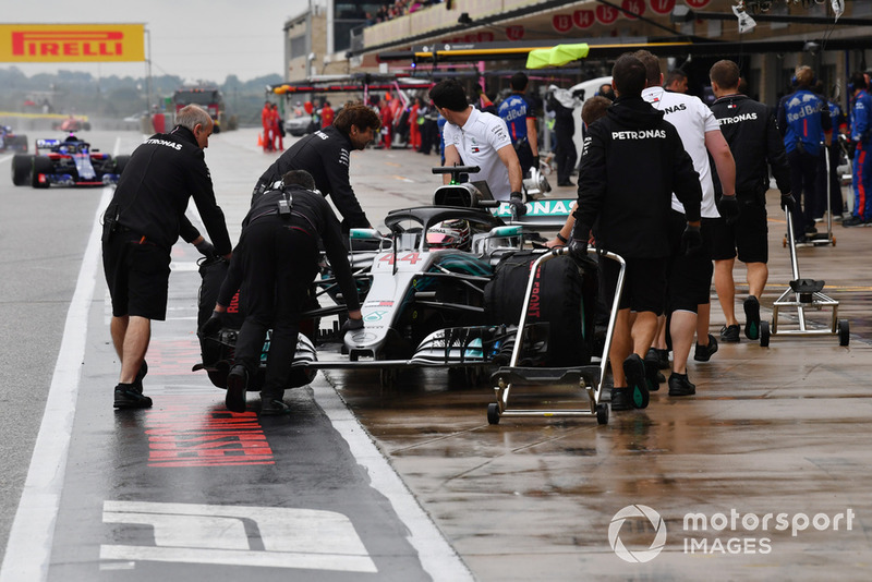 Hamilton is asked to take it easy while entering the pit box in practice