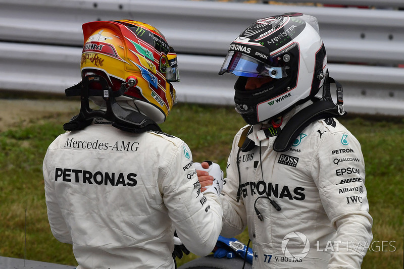 Pole sitter Lewis Hamilton, Mercedes AMG F1 and Valtteri Bottas, Mercedes AMG F1 celebrate in parc ferme
