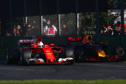Sebastian Vettel, Ferrari SF70H, battles with Max Verstappen, Red Bull Racing RB13