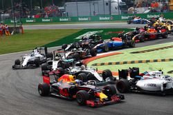 Daniel Ricciardo, Red Bull Racing RB12 and Lewis Hamilton, Mercedes AMG F1 W07 Hybrid at the start o