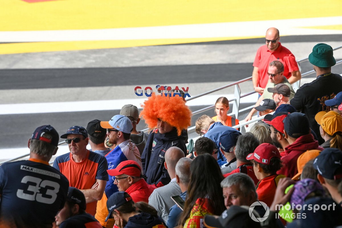 A fan of Max Verstappen, Red Bull Racing, in a grandstand