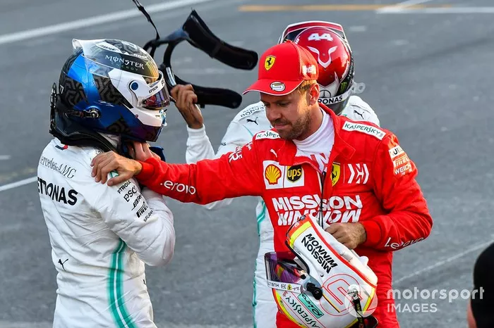 Ganador de la pole Valtteri Bottas y Sebastian Vettel, Ferrari