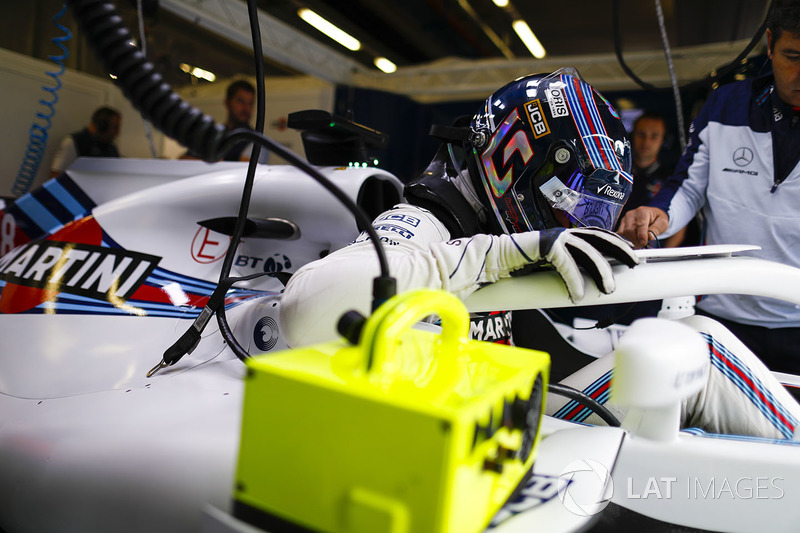 Lance Stroll, Williams Racing, settles into his seat