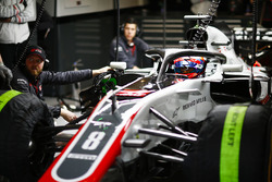 Romain Grosjean, Haas F1 Team VF-18 Ferrari, in the garage