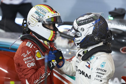 Valtteri Bottas, Mercedes AMG F1, 2nd position, congratulates Sebastian Vettel, Ferrari, 1st positio