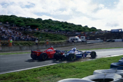 Michael Schumacher, Ferrari F310B turned into Jacques Villeneuve, Williams FW19 Renault at the Curva Dry Sack