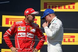 Podium: race winner Sebastian Vettel, Ferrari, third place Valtteri Bottas, Mercedes AMG F1