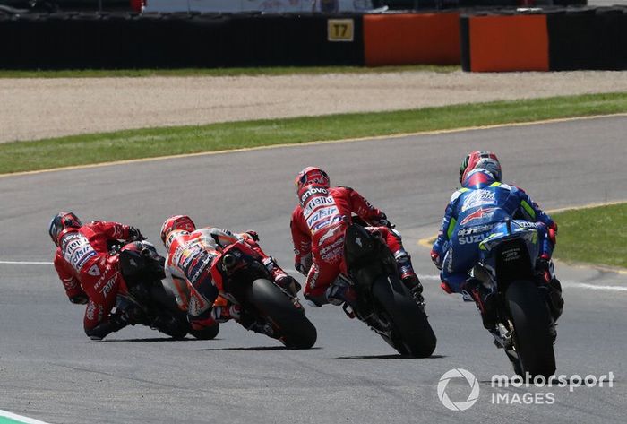 Danilo Petrucci, Ducati Team leads Marc Marquez, Repsol Honda Team