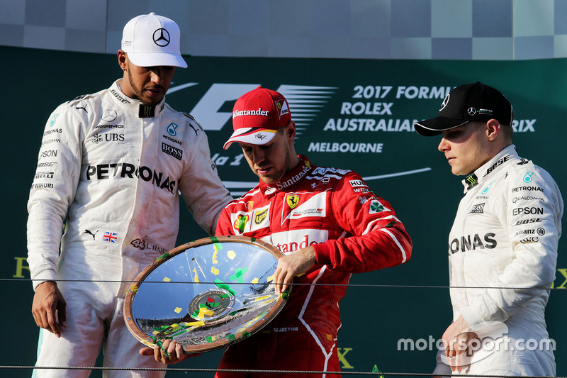 Подіум: переможець гонки Себастьян Феттель, Ferrari, друге місце Льюїс Хемілтон, Mercedes AMG F1, третє місце Валттері Боттас, Mercedes AMG F1