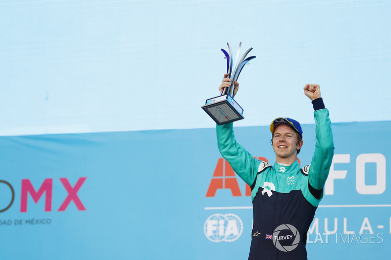 Oliver Turvey, NIO Formula E Team, celebrates on the podium