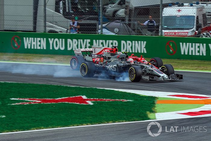 Kevin Magnussen, Haas F1 Team VF-17 y Sebastian Vettel, Ferrari SF70H