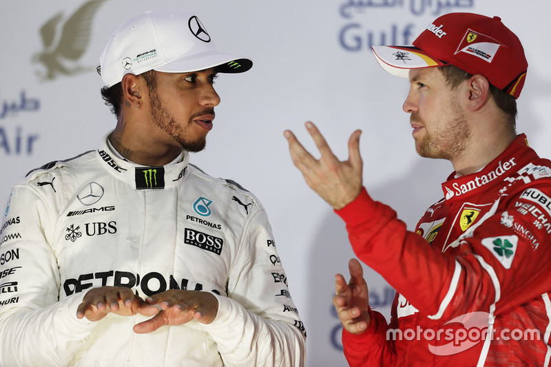 Podium: winner Sebastian Vettel, Ferrari, second place Lewis Hamilton, Mercedes AMG F1, third place 