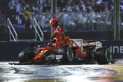 Kimi Raikkonen, Ferrari SF70H leaves his car after his collision, Max Verstappen, Red Bull Racing RB13