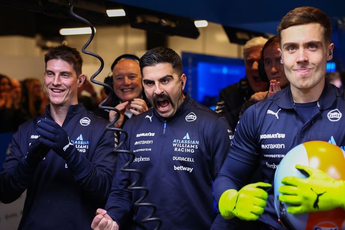 The Williams team celebrates in the garage