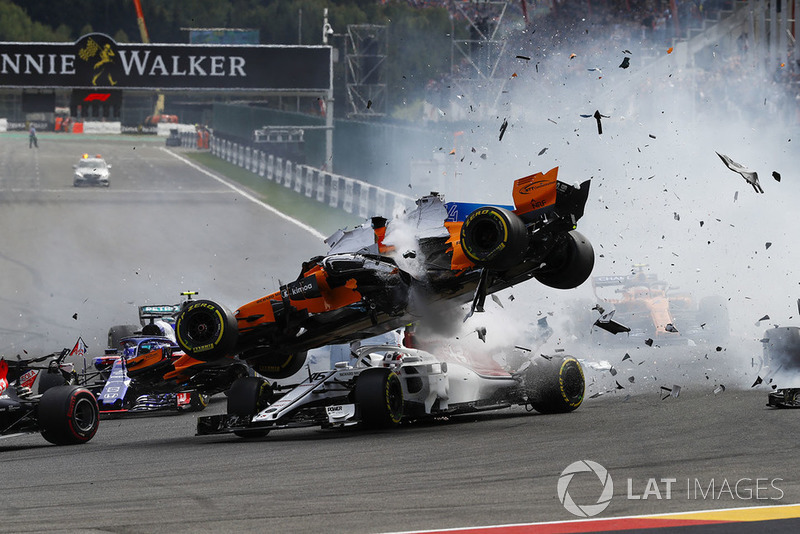 Fernando Alonso, McLaren MCL33, crashes over Charles Leclerc, Sauber C37, after contact from Nico Hulkenberg, Renault Sport F1 Team R.S. 18, at the start