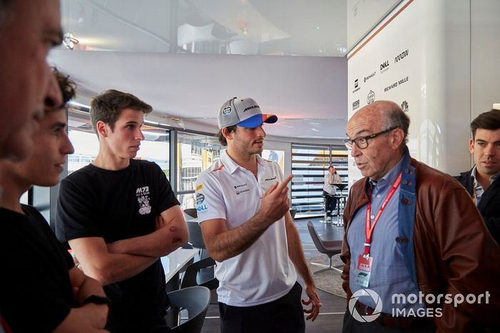 Moto GP riders Alex and Marc Marquez with Carlos Sainz Jr., McLaren