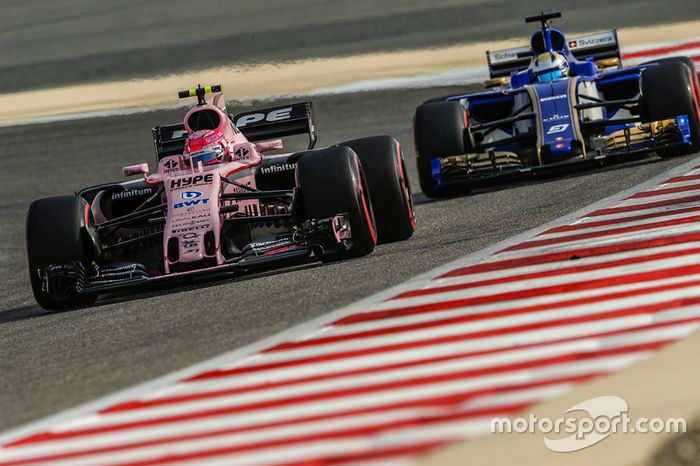 Esteban Ocon, Force India VJM10, leads Marcus Ericsson, Sauber C36