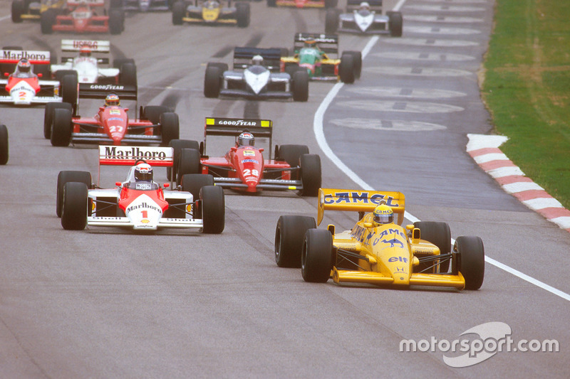 Ayrton Senna, Lotus 99T Honda, leads Alain Prost, McLaren MP4/3 TAG Porsche, and Gerhard Berger, Fer