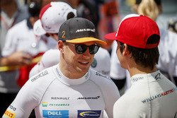 Stoffel Vandoorne, McLaren, and Lance Stroll, Williams Racing, on the grid