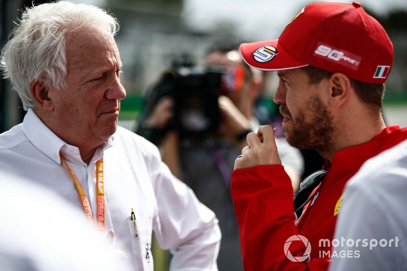 Charlie Whiting, Direttore di gara, FIA, con Sebastian Vettel, Ferrari
