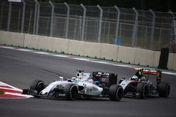 Felipe Massa, Williams Martini Racing FW38 leads Sergio Perez, Force India F1 VJM09